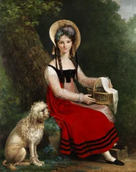 Jeune fille avec un caniche sur un banc de gazon